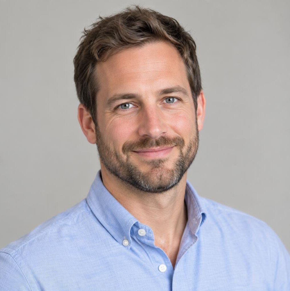 Portrait of a man with short hair and a beard