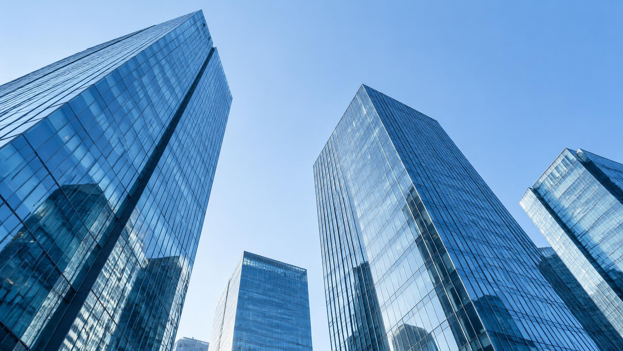 Glass office buildings seen from below
